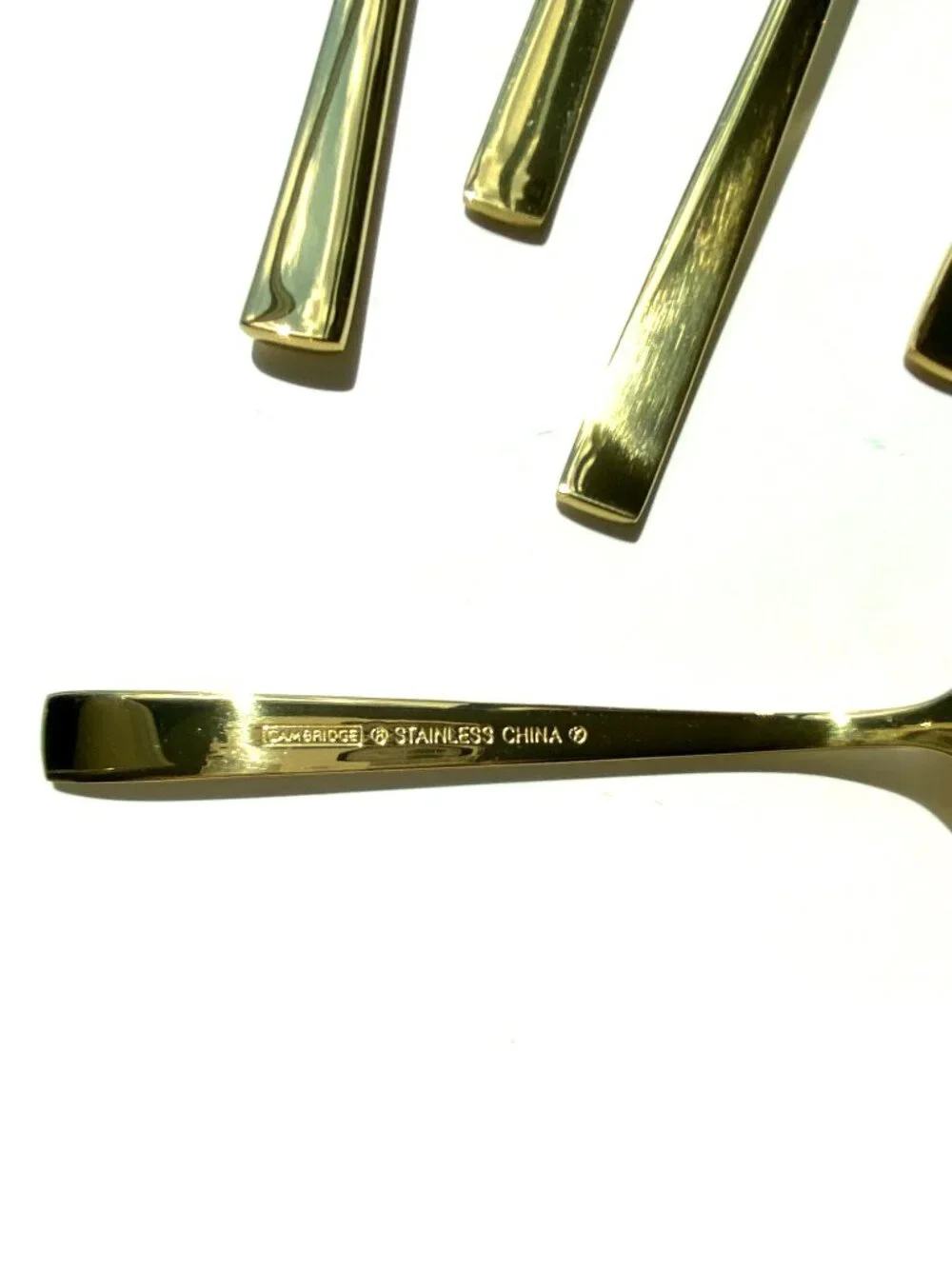 Crate&Barrel gold flatware “Ellenore” by Cambridge. 4 place settings, NIB.